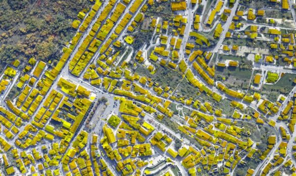 BUILDING SEGMENTATION IN VERTICAL AERIAL IMAGES