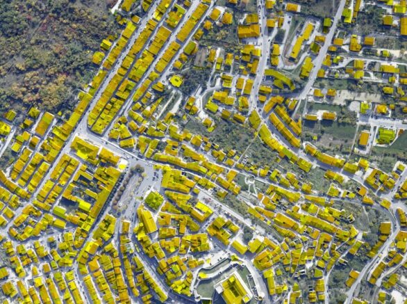 BUILDING SEGMENTATION IN VERTICAL AERIAL IMAGES